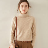 Damtröja i kashmir med turtleneck, texturerad stickad polokrage