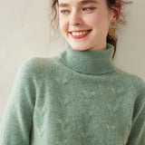 Damtröja i kashmir med turtleneck, texturerad stickad polokrage