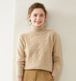 Damtröja i kashmir med turtleneck, texturerad stickad polokrage