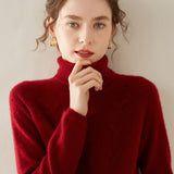Damtröja i kashmir med turtleneck, texturerad stickad polokrage