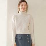 Damtröja i kashmir med turtleneck, texturerad stickad polokrage