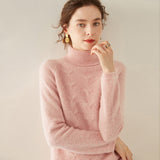 Damtröja i kashmir med turtleneck, texturerad stickad polokrage
