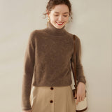 Damtröja i kashmir med turtleneck, texturerad stickad polokrage